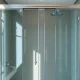 Elegant shower sliding doors open, showcasing modern design and smooth functionality.
