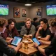 SBOBET88 betting experience in a vibrant lounge with friends placing bets and enjoying sports events