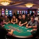 Players revel in dynamic gameplay at hitclub's bustling casino floor, surrounded by colorful slot machines.