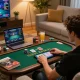 Player enjoying live dealer blackjack on LV88 app, surrounded by snacks and strategy notes.