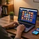 Player enjoying online gambling at UU88 with vibrant slot games on laptop screen