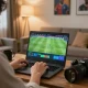 SOCOLIVE user engaging in live sports betting while watching a soccer match online at home