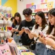 Eye-catching custom acrylic keychain collection displayed in a vibrant retail environment, highlighting creative designs and personalization.