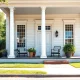 Engaging colonial home renovation featuring classic architecture and inviting garden details.