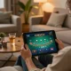 LEMACAU player enjoying online blackjack game on tablet at home with strategic setup.