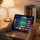 Player engaging with LC88 casino app on a tablet in a cozy home environment, highlighting responsible gaming.
