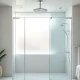 Experience elegant showers in a luxurious bathroom with modern design and natural light.